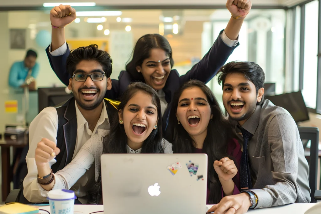 group happy indian business people celebrating success